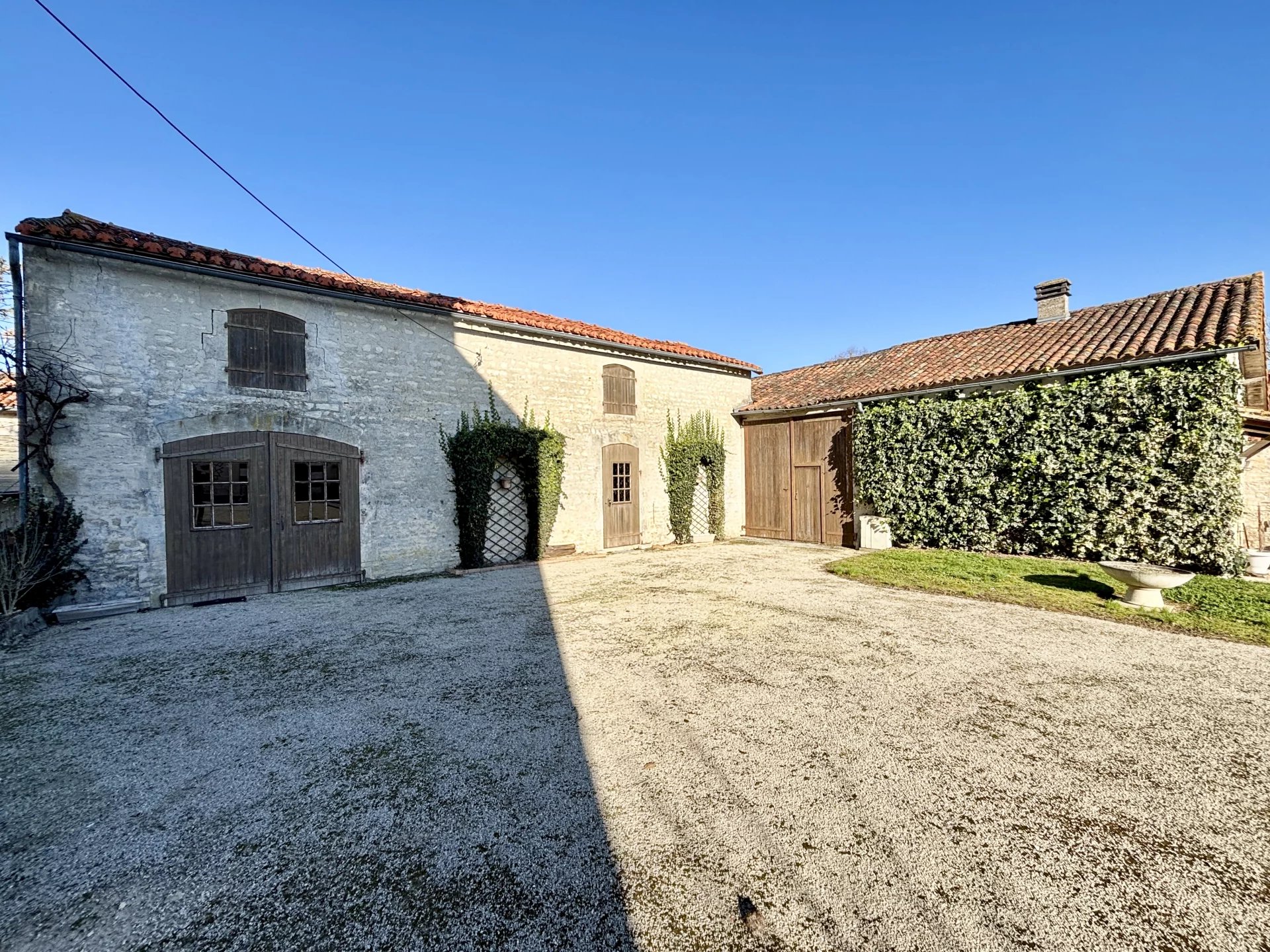 Grand character village home with two further properties, outbuildings and enclosed garden, Poitou-Charentes – France – BVI78982