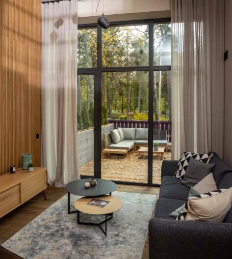 Modern loft with a large terrace in the very center of Jurmala, close to the forest park and white beach