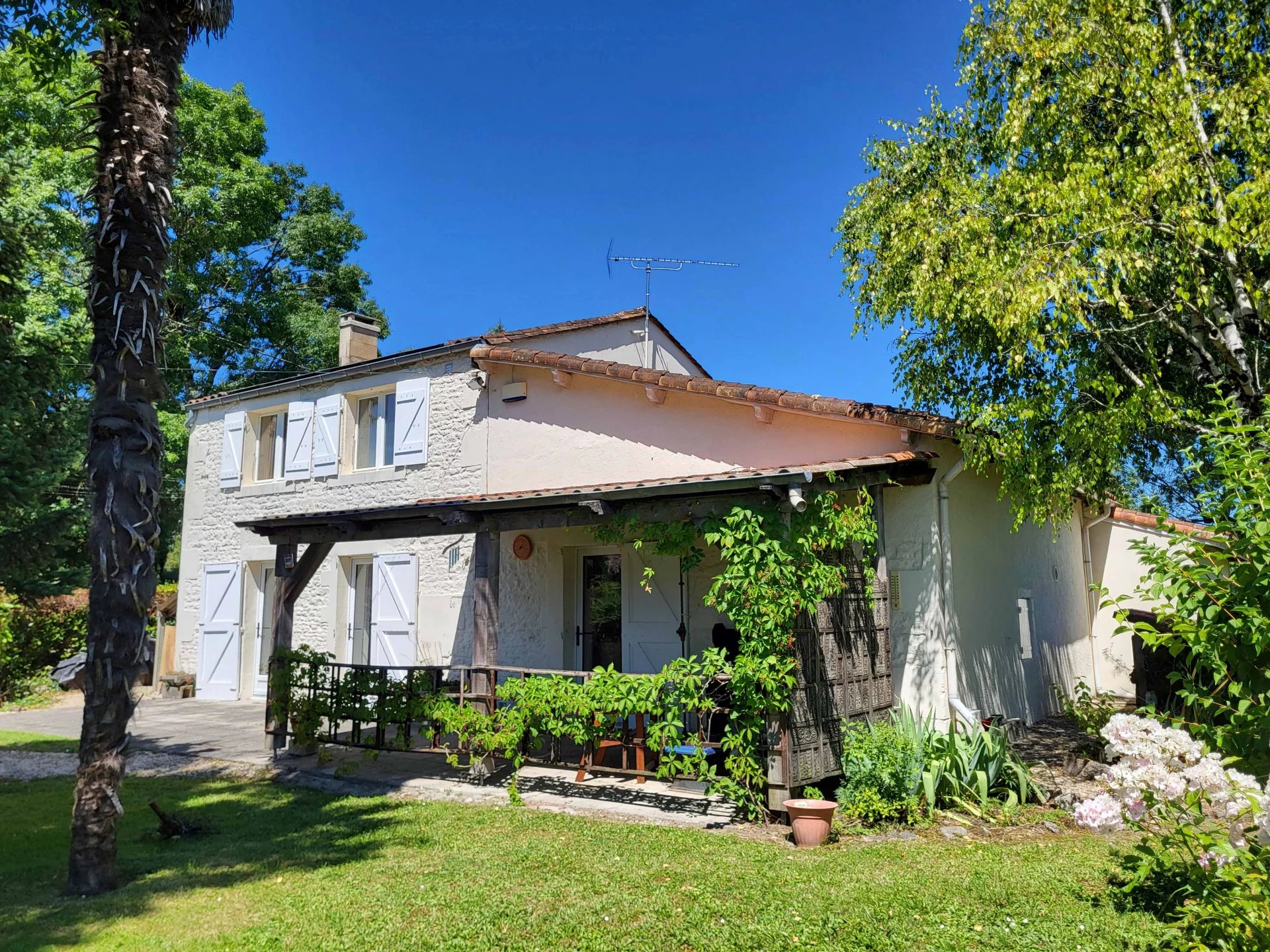 Detached stone village house with enclosed garden, garages and solar-panels, Poitou-Charentes – France – BVI72315
