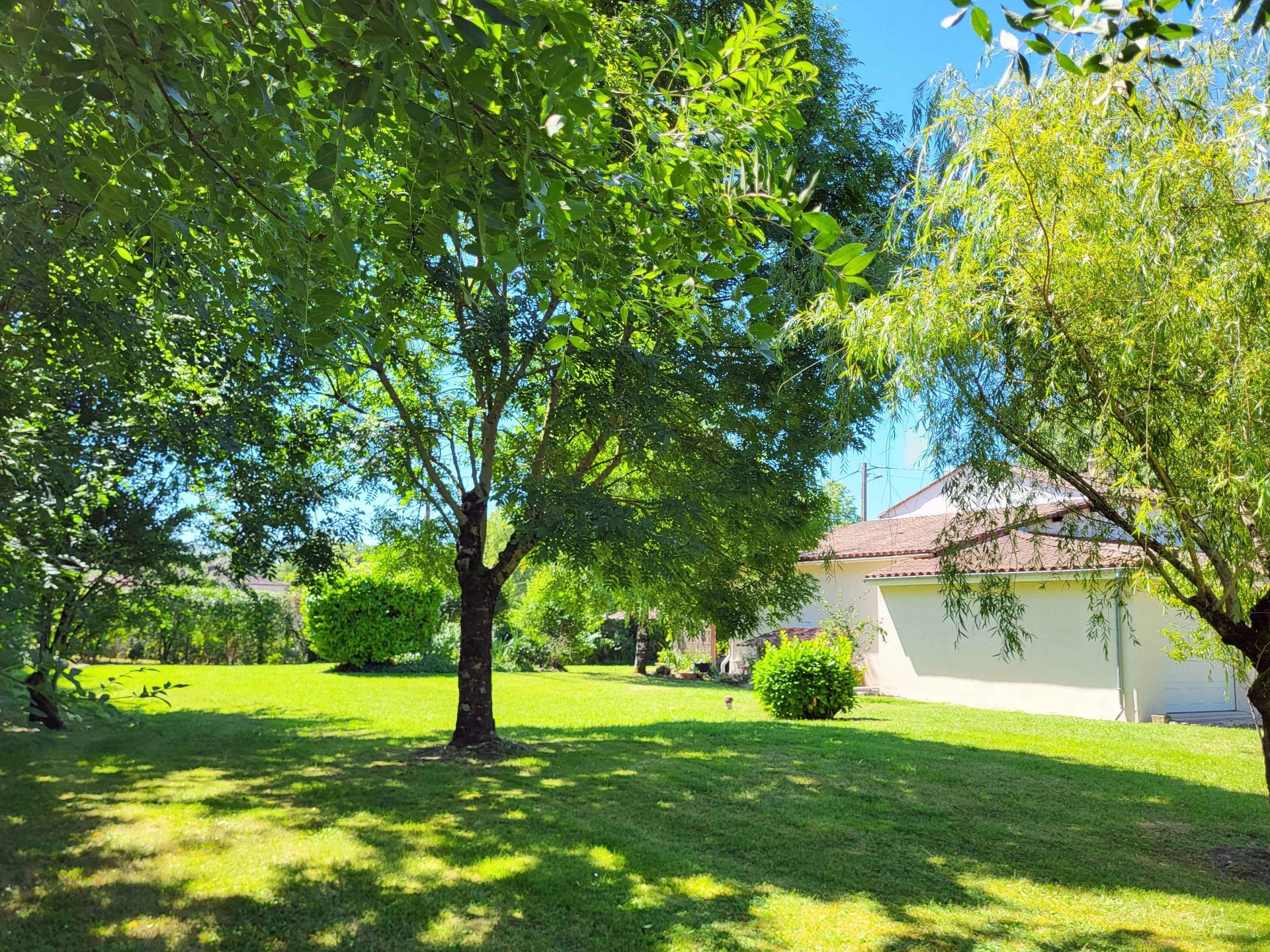 Detached stone village house with enclosed garden, garages and solar-panels, Poitou-Charentes – France – BVI72315