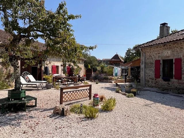 Two dwellings on the edge of a popular village, Aquitaine – France – BVI76695