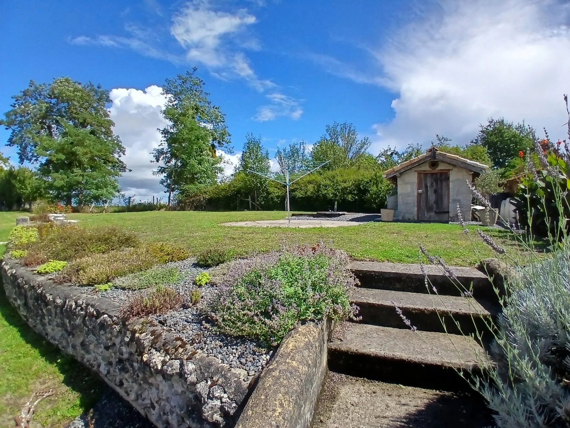 Two picturesque stone cottages set in the countryside, Poitou-Charentes – France – BVI82306