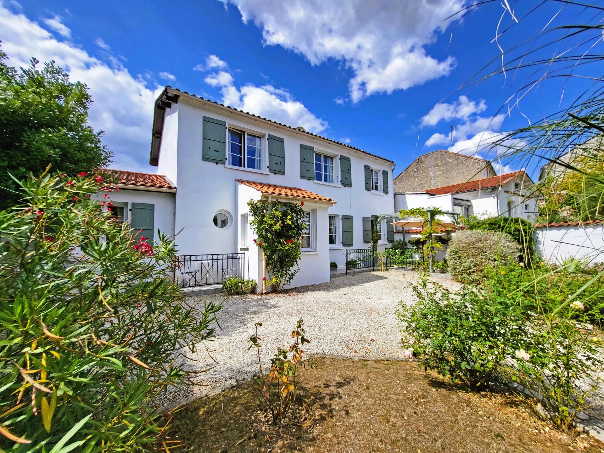 Large, handsome family home with private gardens in the centre of Jarnac, Poitou-Charentes – France – BVI82261