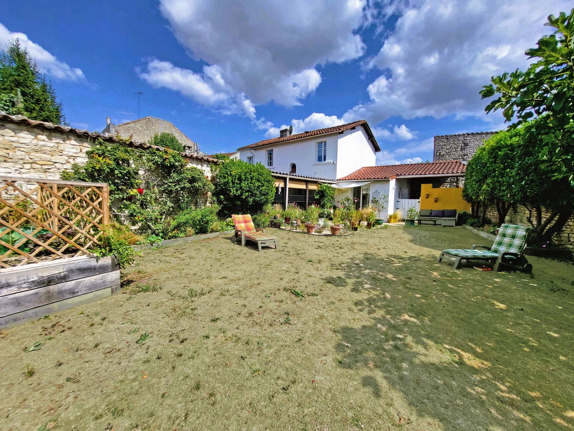 Large, handsome family home with private gardens in the centre of Jarnac, Poitou-Charentes – France – BVI82261