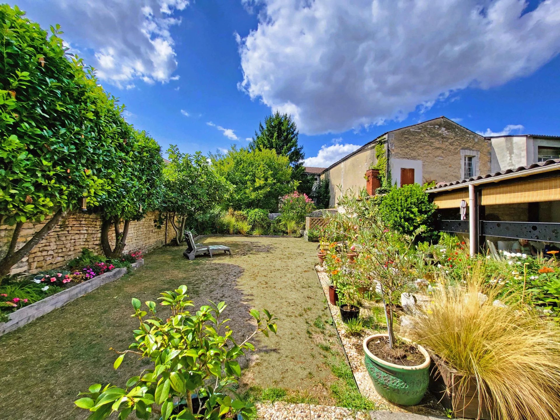 Large, handsome family home with private gardens in the centre of Jarnac, Poitou-Charentes – France – BVI82261