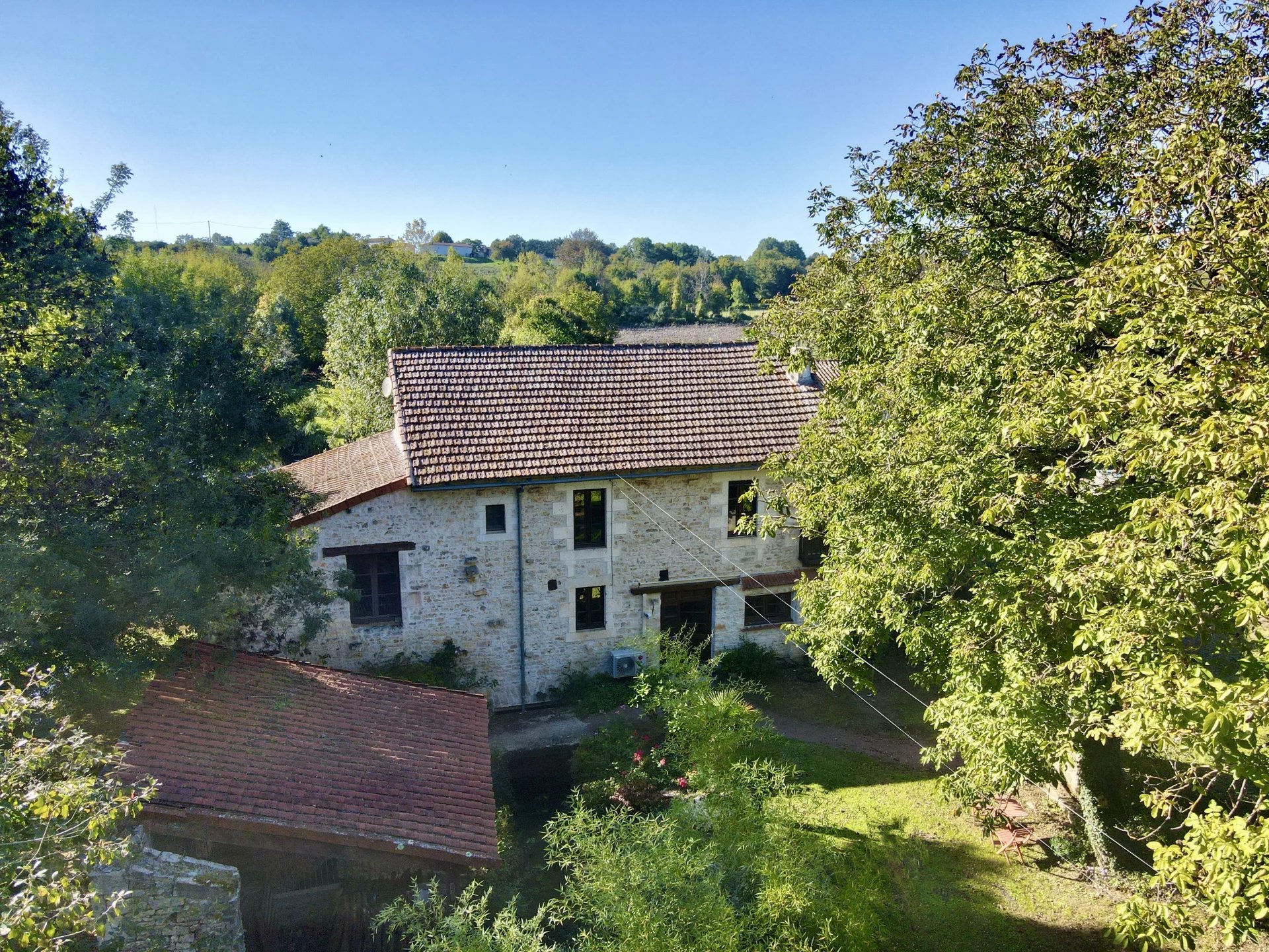 Beautiful former watermill in an idyllic riverside setting, Poitou-Charentes – France – BVI83002