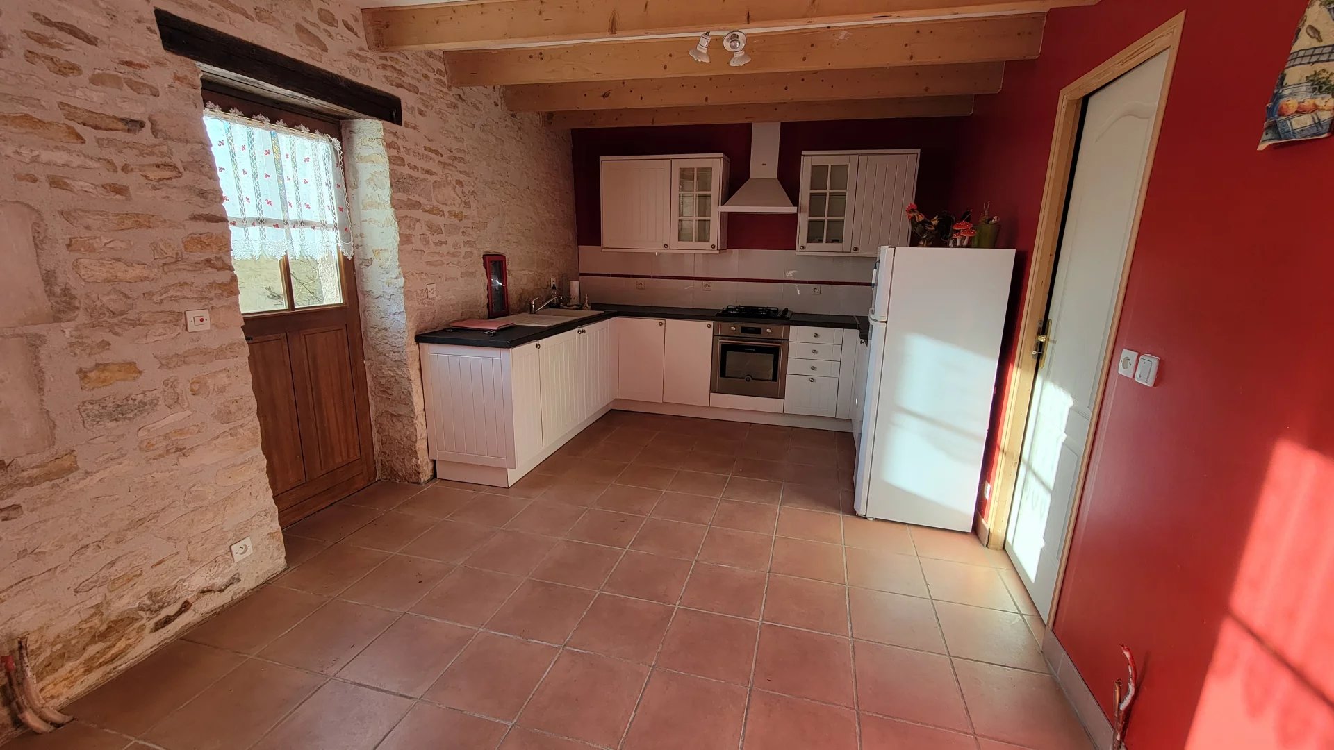 Renovated stone village house offering three bedrooms and a study with garden, Poitou-Charentes – France – BVI83650