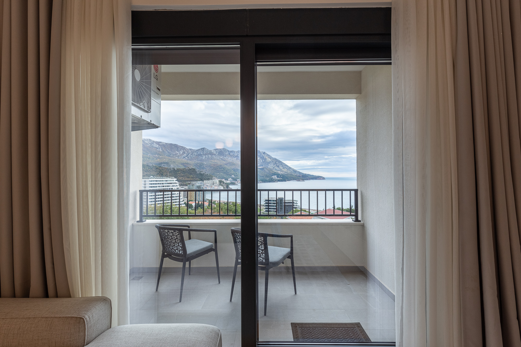 Luxury Two-Bedroom Apartment in Bečići – Panoramic Sea View of Sveti Stefan