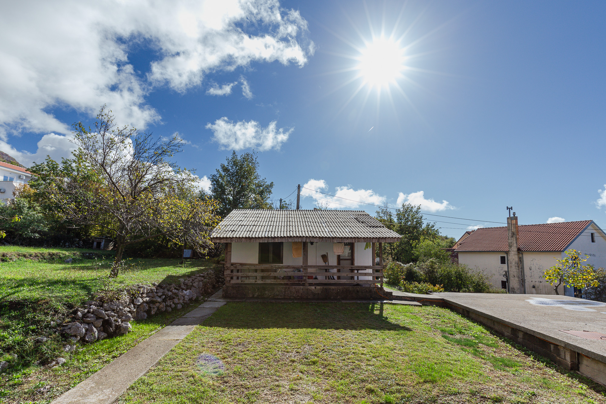 Urbanized Plot with Sea View and Own Water Source – Lapčići, 1,000 m²