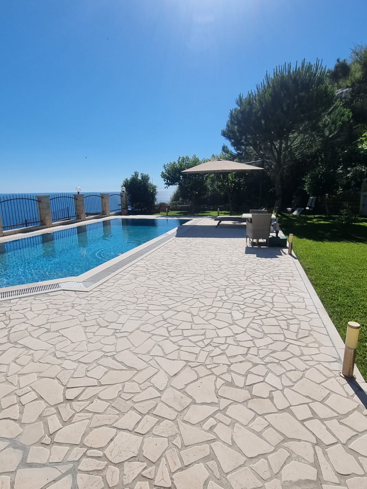 Elegance and serenity in a luxurious villa with natural views.