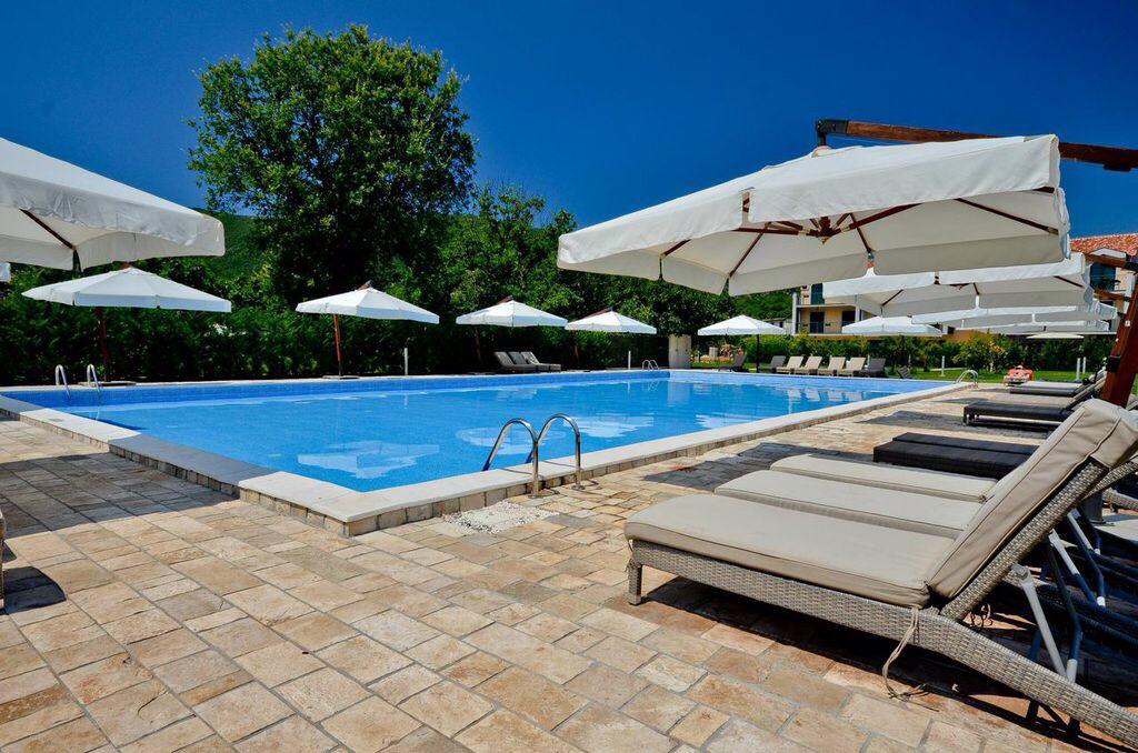 House in a complex with a swimming pool