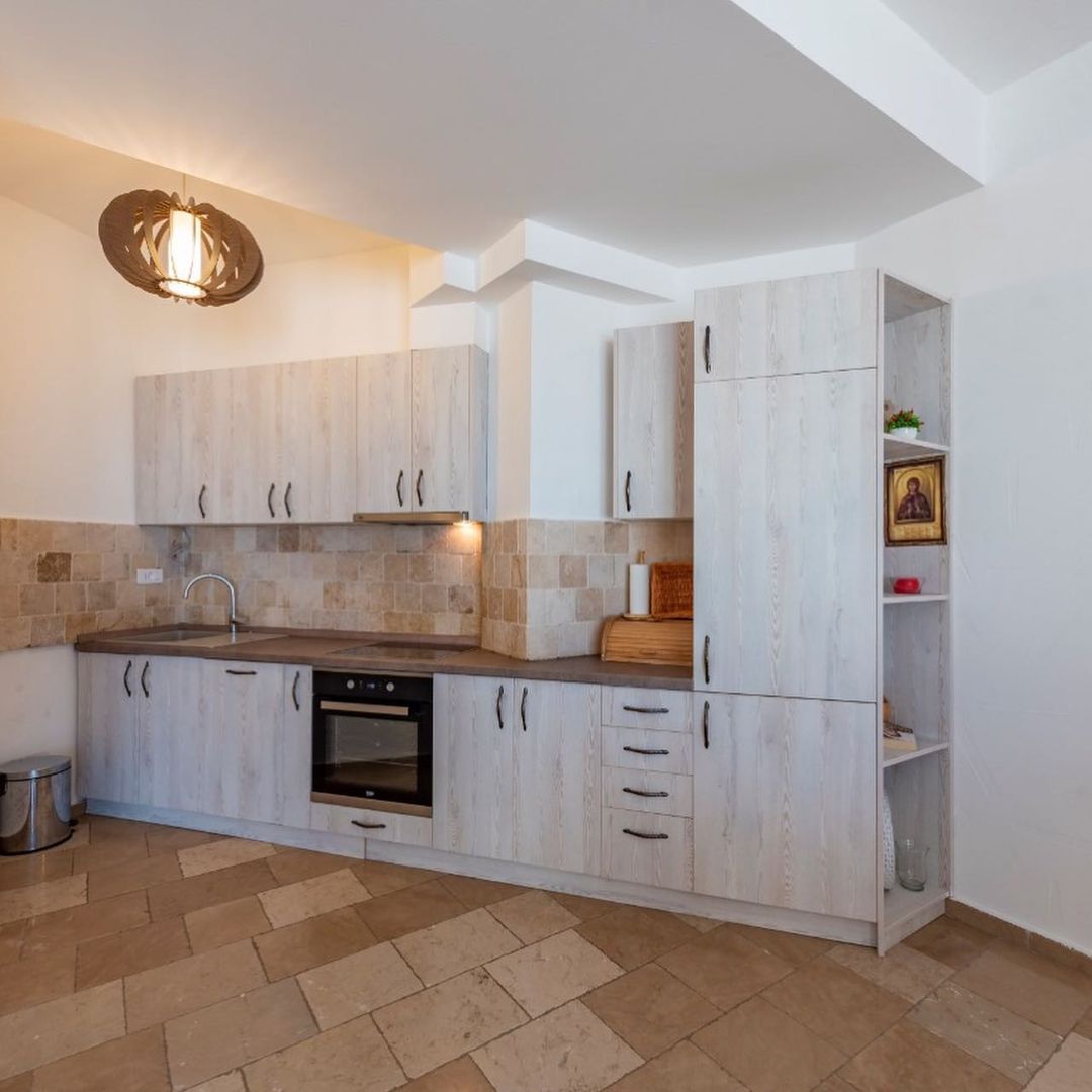 A complex of 6 villas with a swimming pool with an open sea view