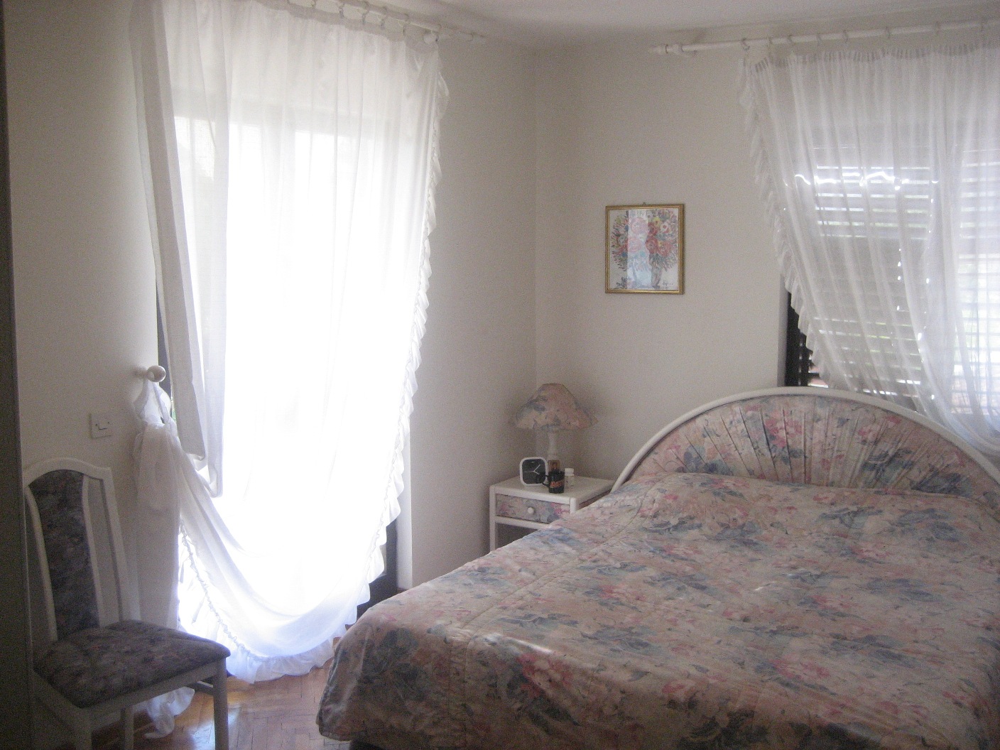 Spacious house surrounded by palm trees