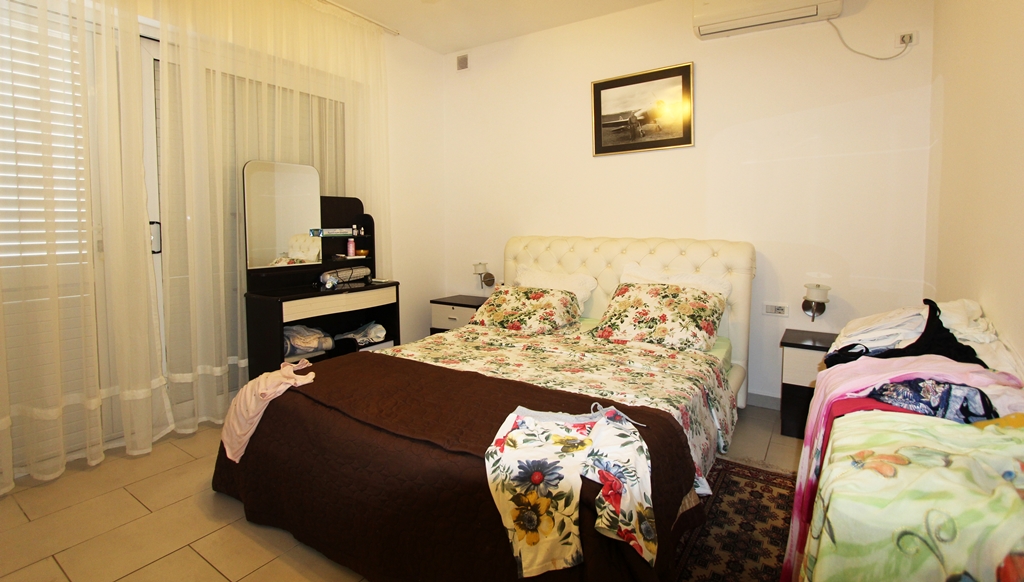 House with golf course and tennis court