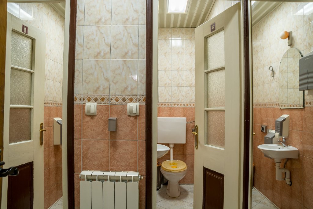 Two houses with restaurant on the front line