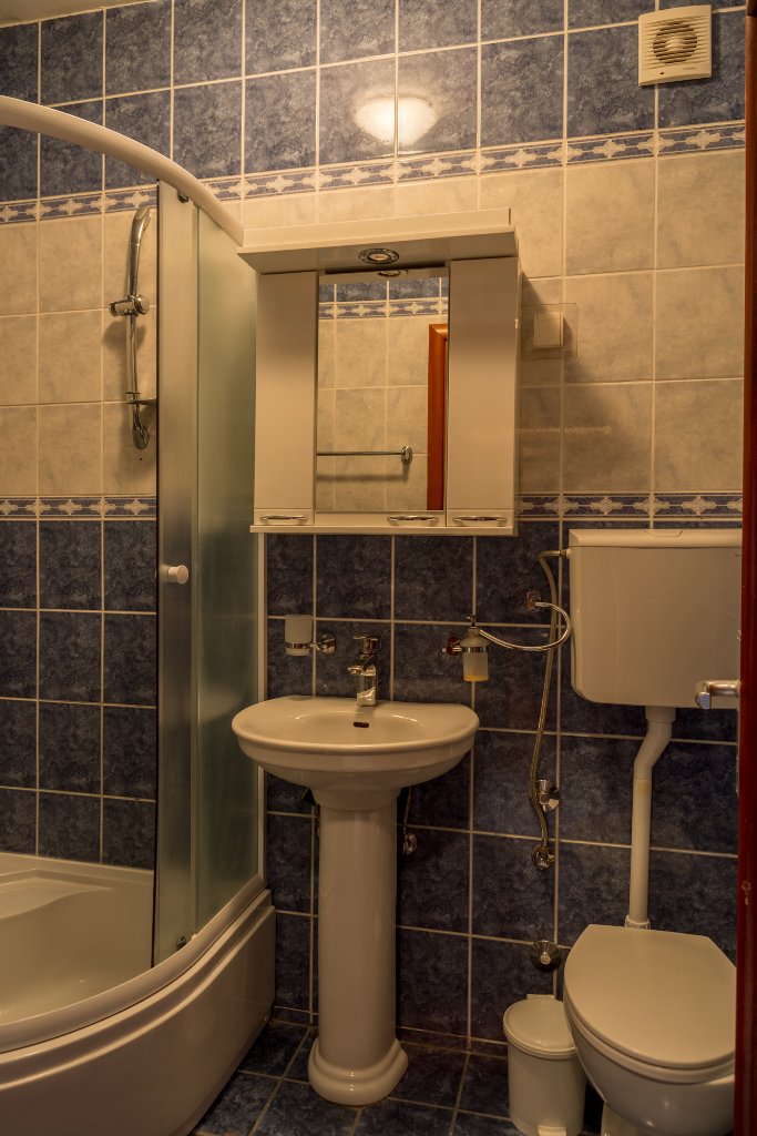 Two houses with restaurant on the front line