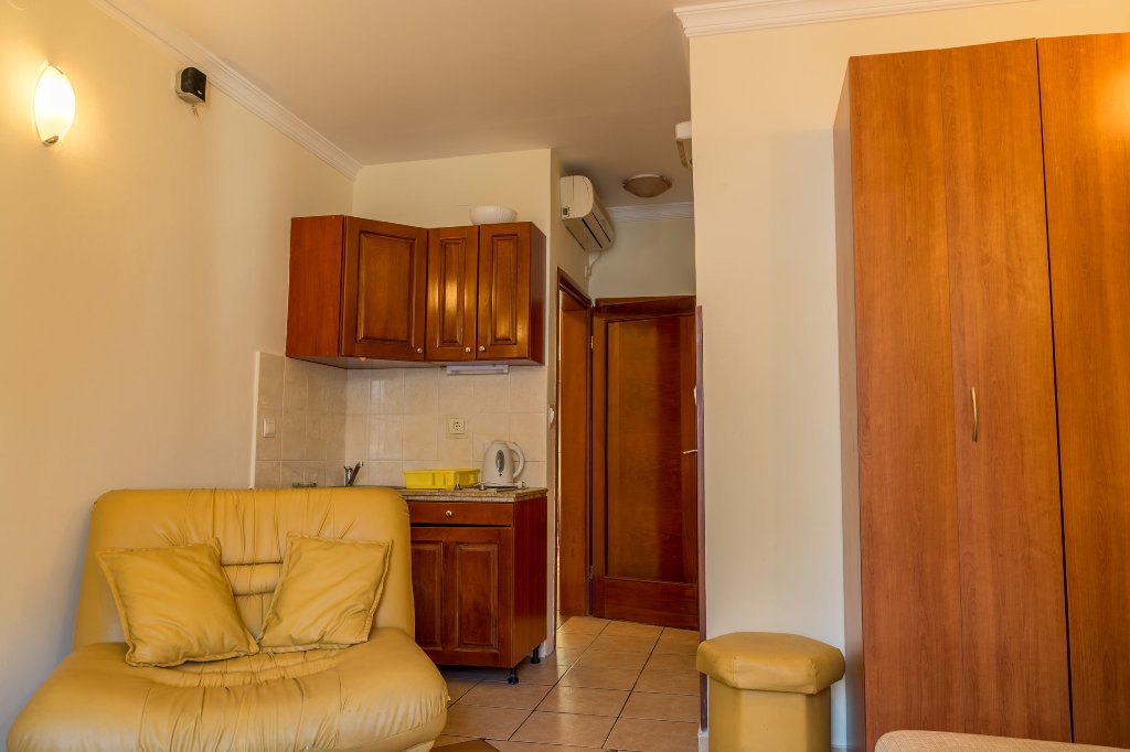 Two houses with restaurant on the front line