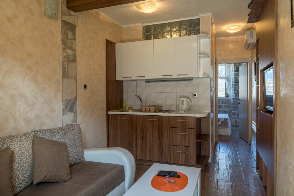 Two houses with restaurant on the front line