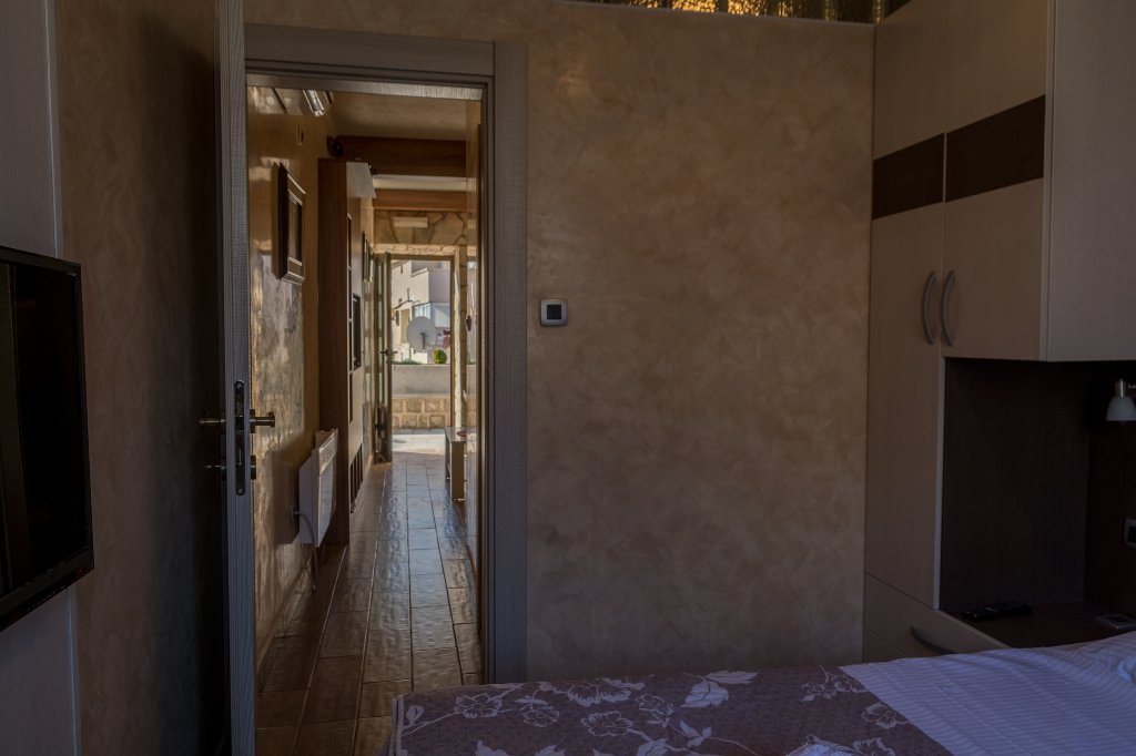 Two houses with restaurant on the front line