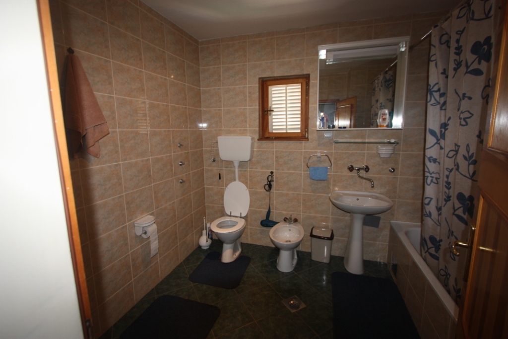 Three-storey house with pool in Lustica