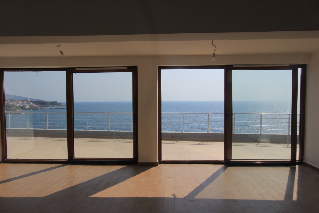 Apartments in a complex with a swimming pool and sea views in Dobra Voda