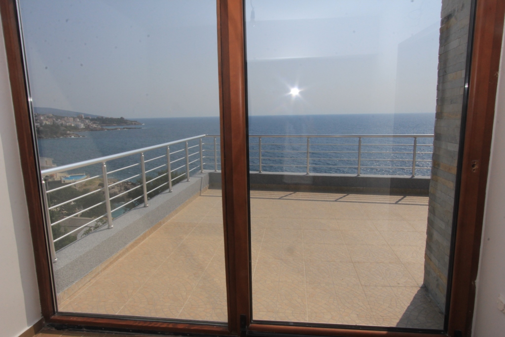 Apartments in a complex with a swimming pool and sea views in Dobra Voda