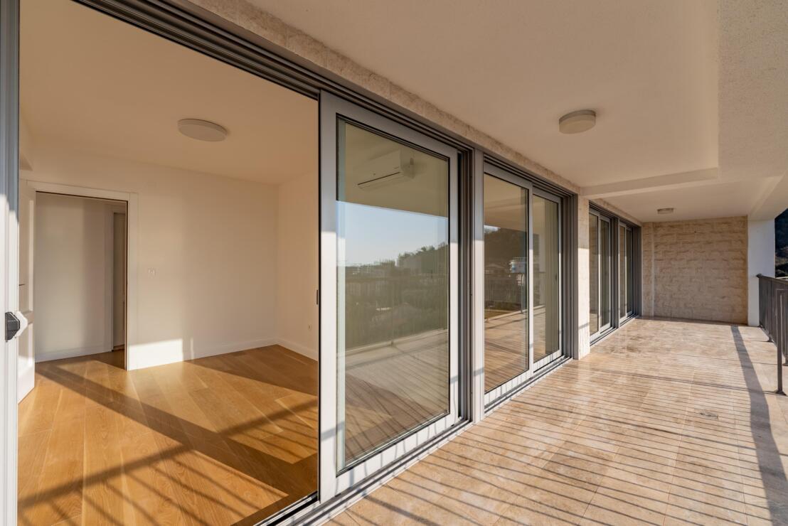 Spacious and bright three-bedroom apartment with panoramic sea view for sale.