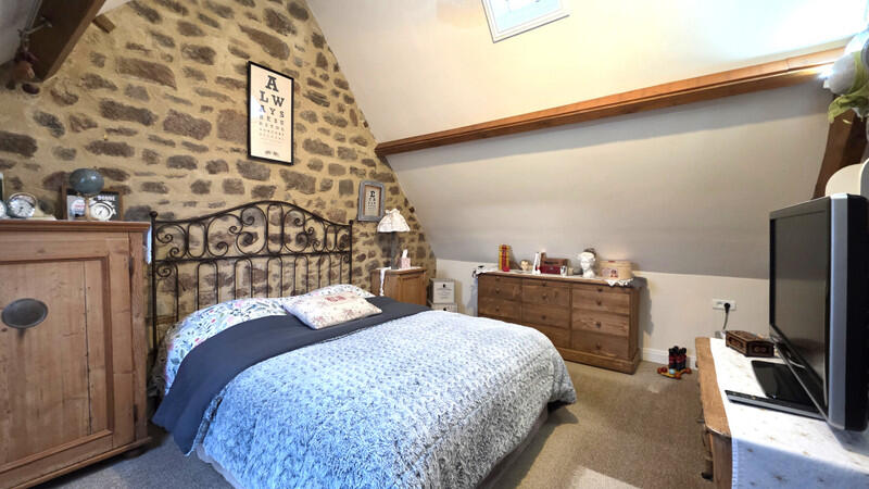 A rare opportunity to acquire a substantial home with a gîte and a range of outbuildings.