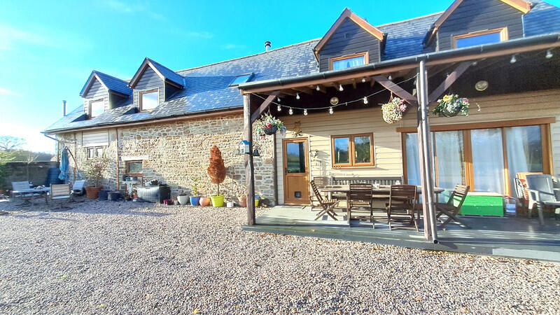 Beautiful, fully detached stone property situated in a peaceful rural setting, comprising 4 bedrooms and a holiday apartment, ideal for a seasonal rental business