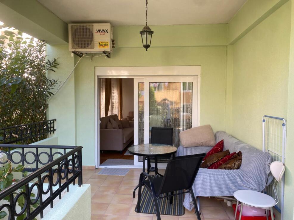 Stylish two-bedroom apartment for sale in a club house with a swimming pool and a real garden.