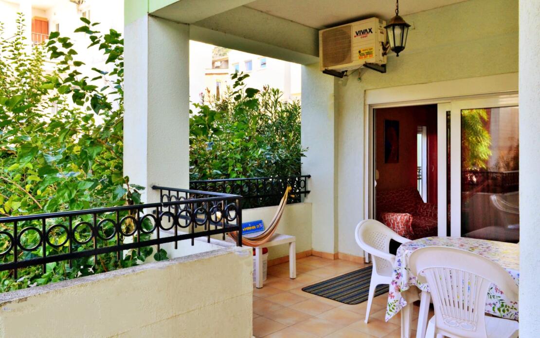 Stylish two-bedroom apartment for sale in a club house with a swimming pool and a real garden.