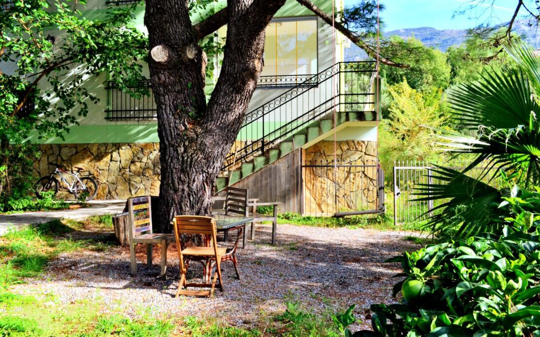 Stylish two-bedroom apartment for sale in a club house with a swimming pool and a real garden.