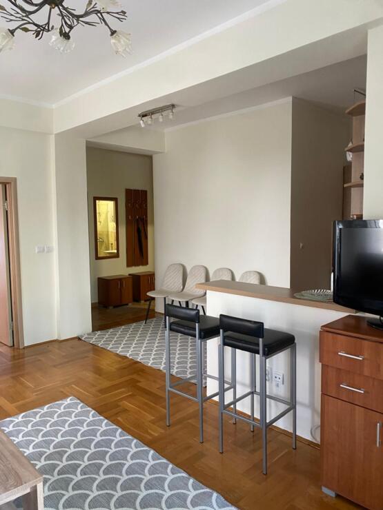 Stylish two-bedroom apartment for sale in a club house with a swimming pool and a real garden.