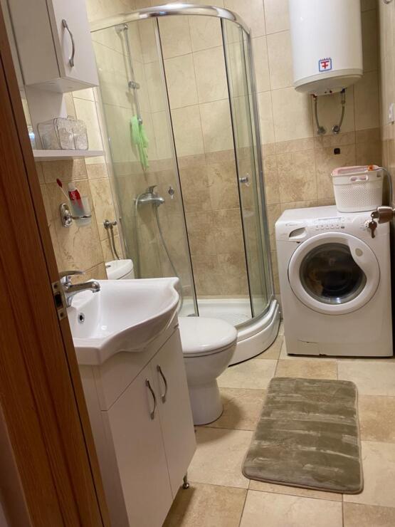 Stylish two-bedroom apartment for sale in a club house with a swimming pool and a real garden.