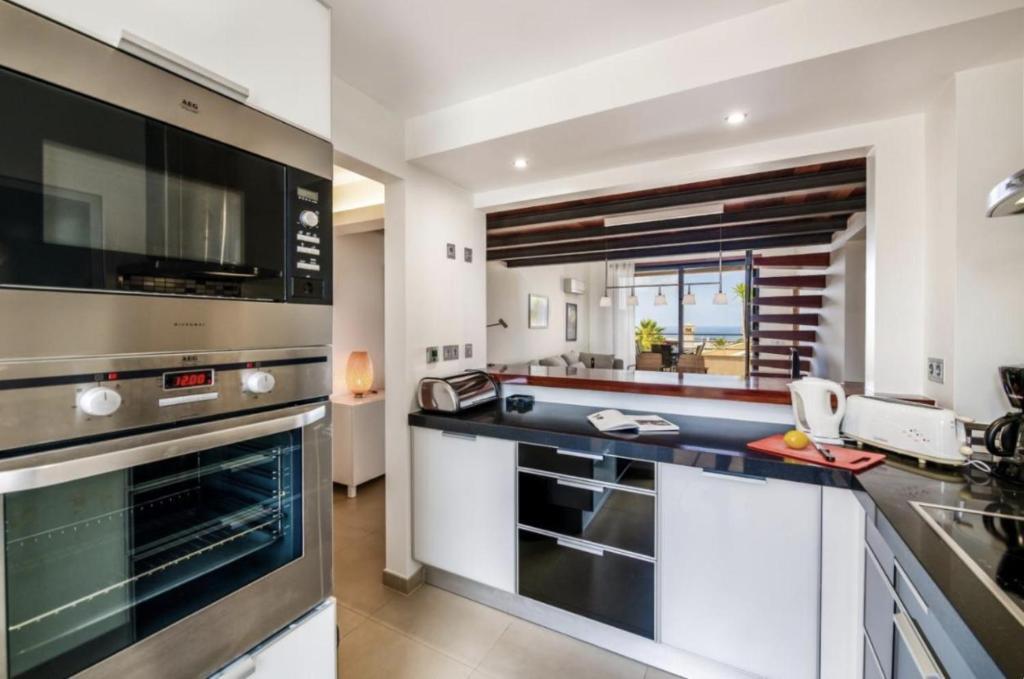 Luxury 2-Bedroom Apartment with Ocean Views for Sale in Praia da Luz, Algarve, Portugal