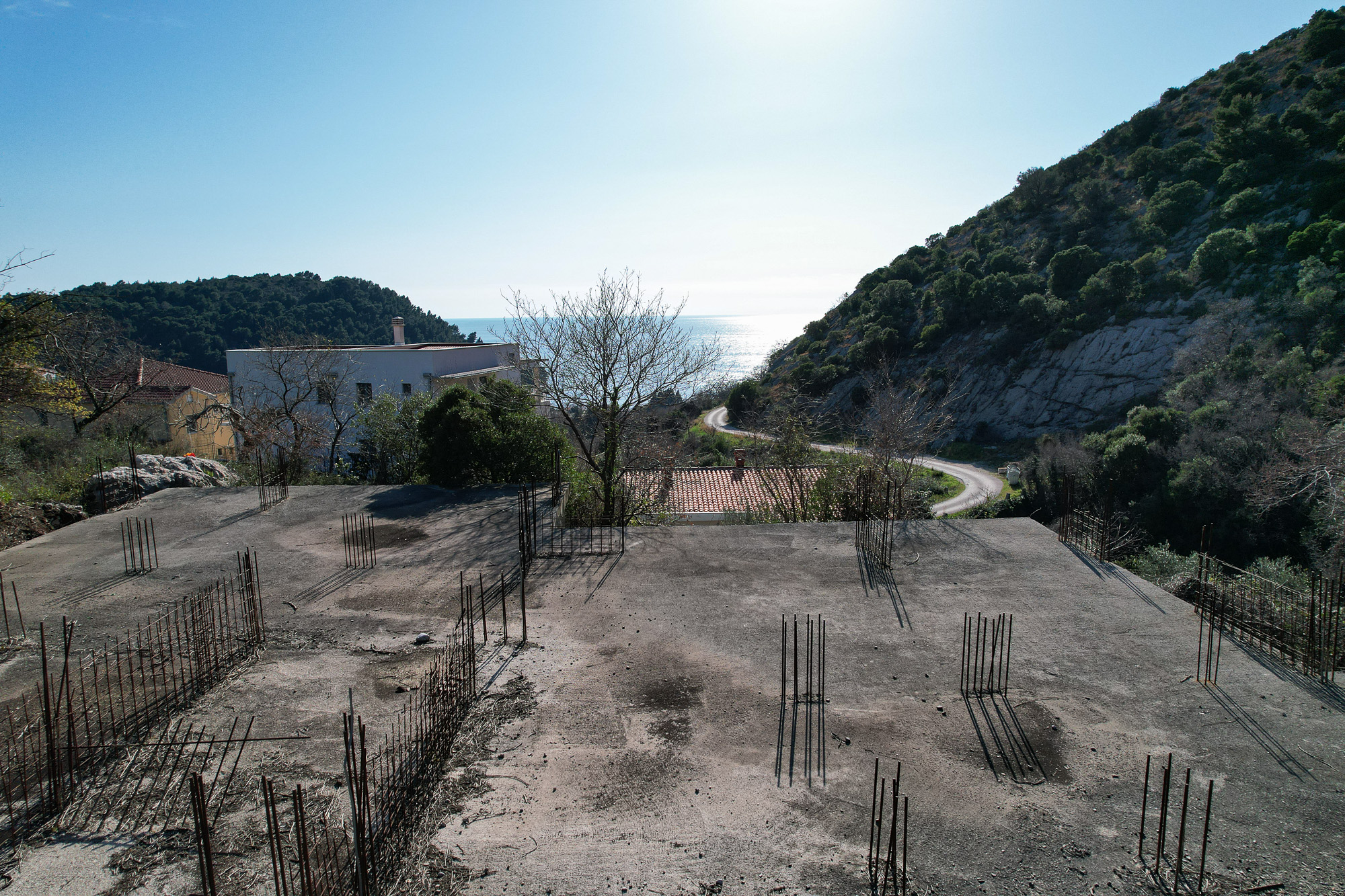 Investment Plot with Approved Project and Foundation in Petrovac with Sea View