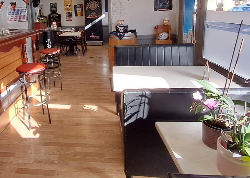 A vibrant café-bar ideally located in the heart of a bustling city in Normandy – France