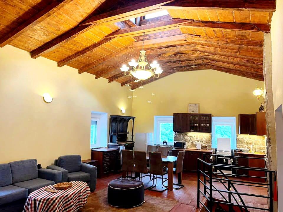 A restored 17th-century stone manor house, 208 m², on a 9,400 m² plot near Budva, is for sale.