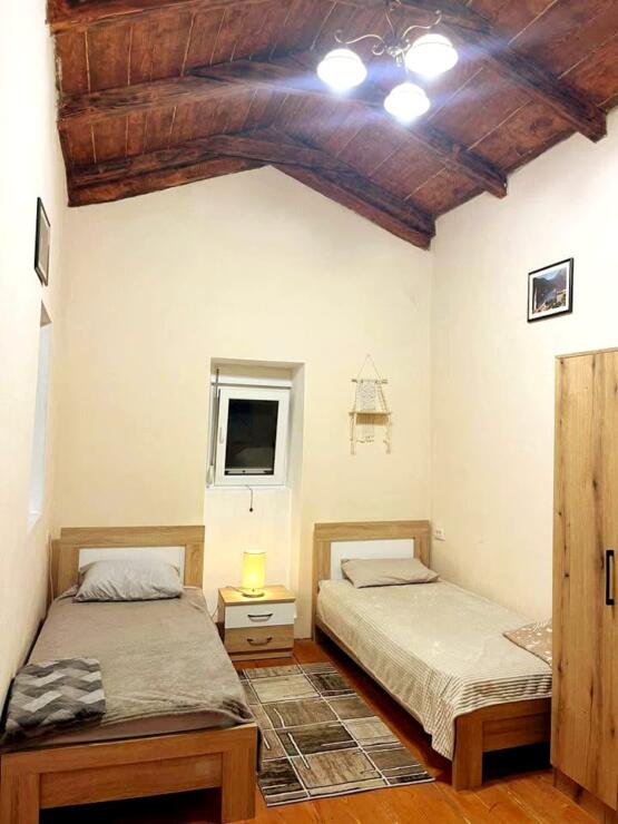 A restored 17th-century stone manor house, 208 m², on a 9,400 m² plot near Budva, is for sale.