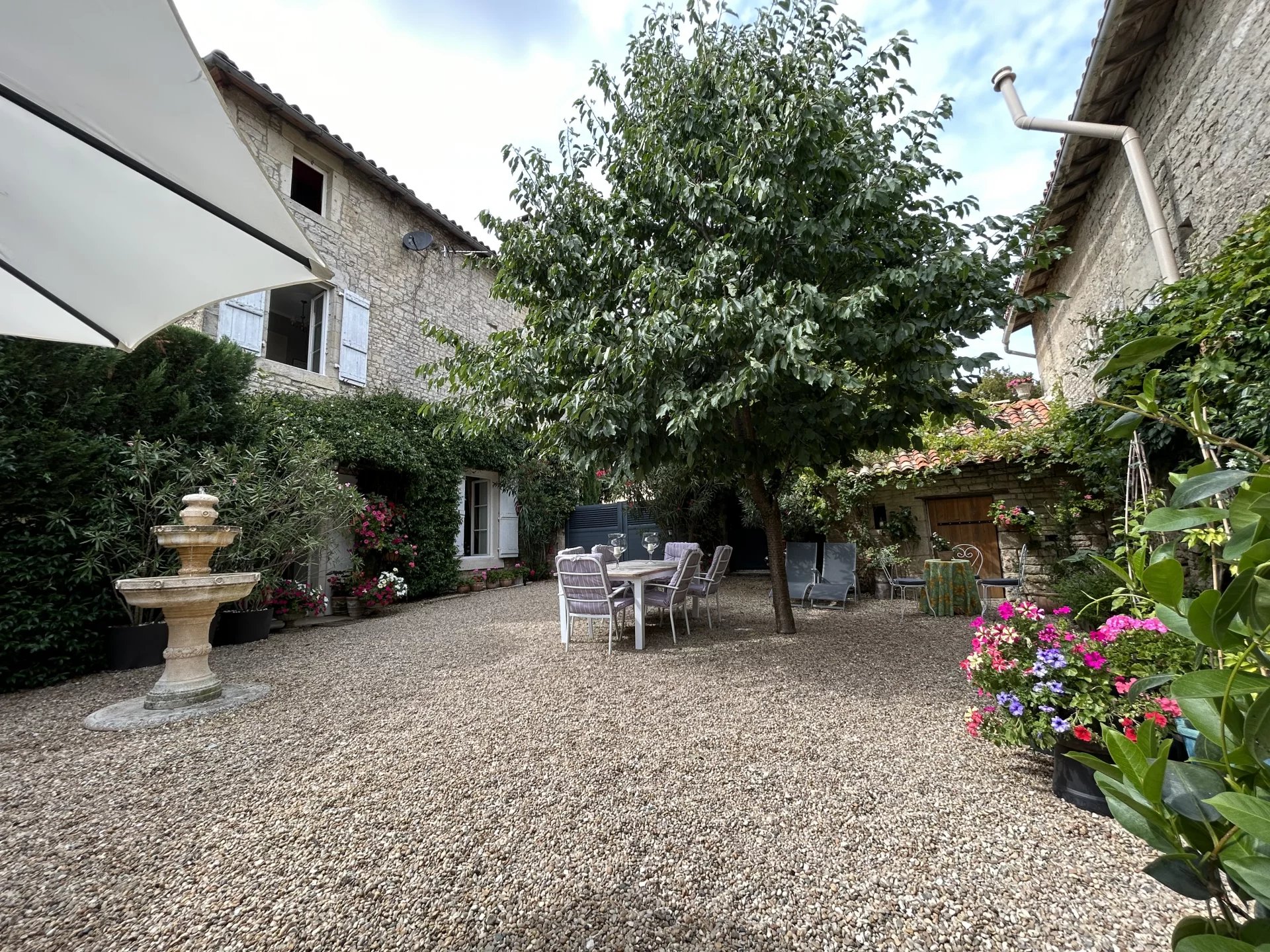 Stylish 3-storey village property with courtyard and large garage, Poitou-Charentes – France – BVI69669