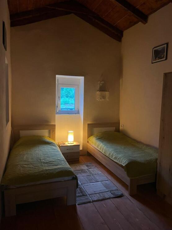 A restored 17th-century stone manor house, 208 m², on a 3700 m² plot near Budva, is for sale.