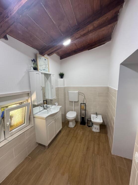 A restored 17th-century stone manor house, 208 m², on a 3700 m² plot near Budva, is for sale.