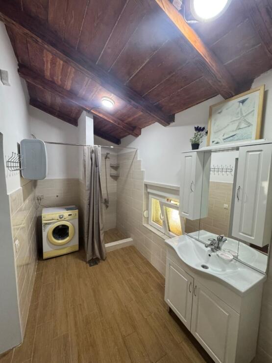 A restored 17th-century stone manor house, 208 m², on a 3700 m² plot near Budva, is for sale.