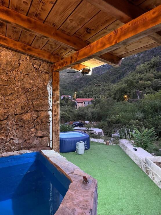 A restored 17th-century stone manor house, 208 m², on a 3700 m² plot near Budva, is for sale.
