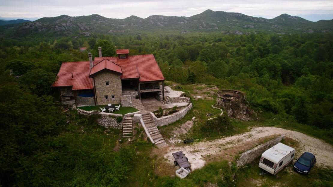 A restored 17th-century stone manor house, 208 m², on a 3700 m² plot near Budva, is for sale.