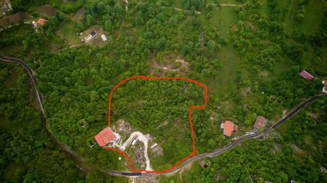 A restored 17th-century stone manor house, 208 m², on a 3700 m² plot near Budva, is for sale.