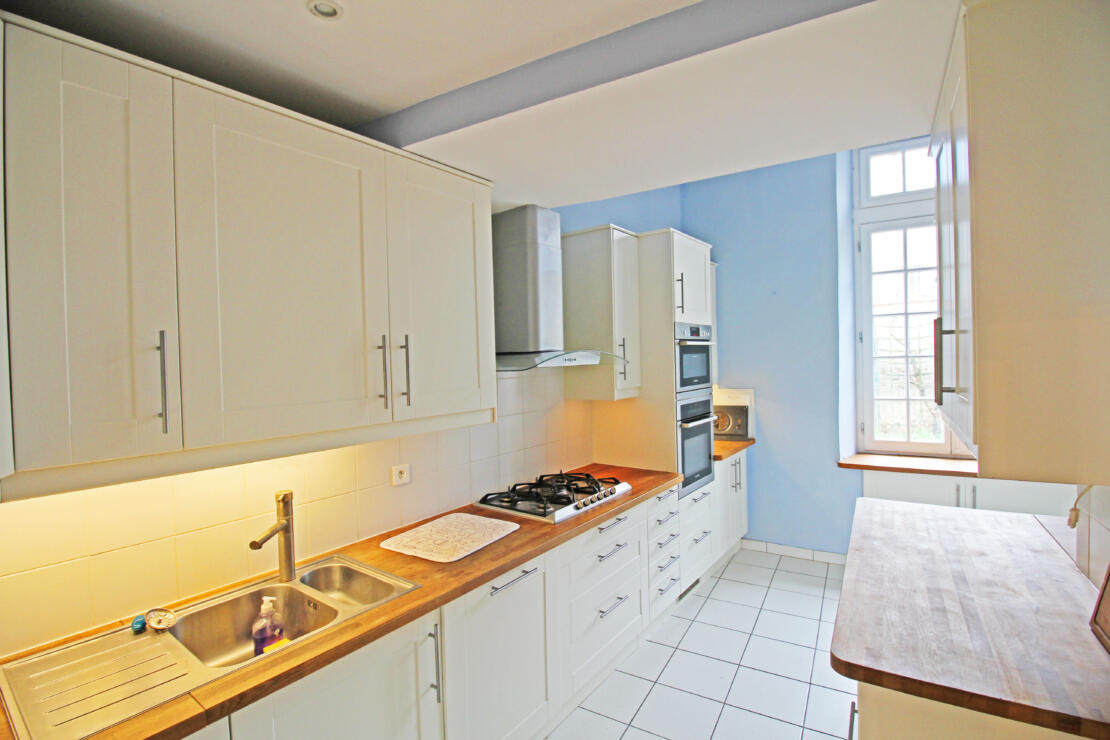 Beautiful chateau for sale with a pool, modern comforts and original historic features