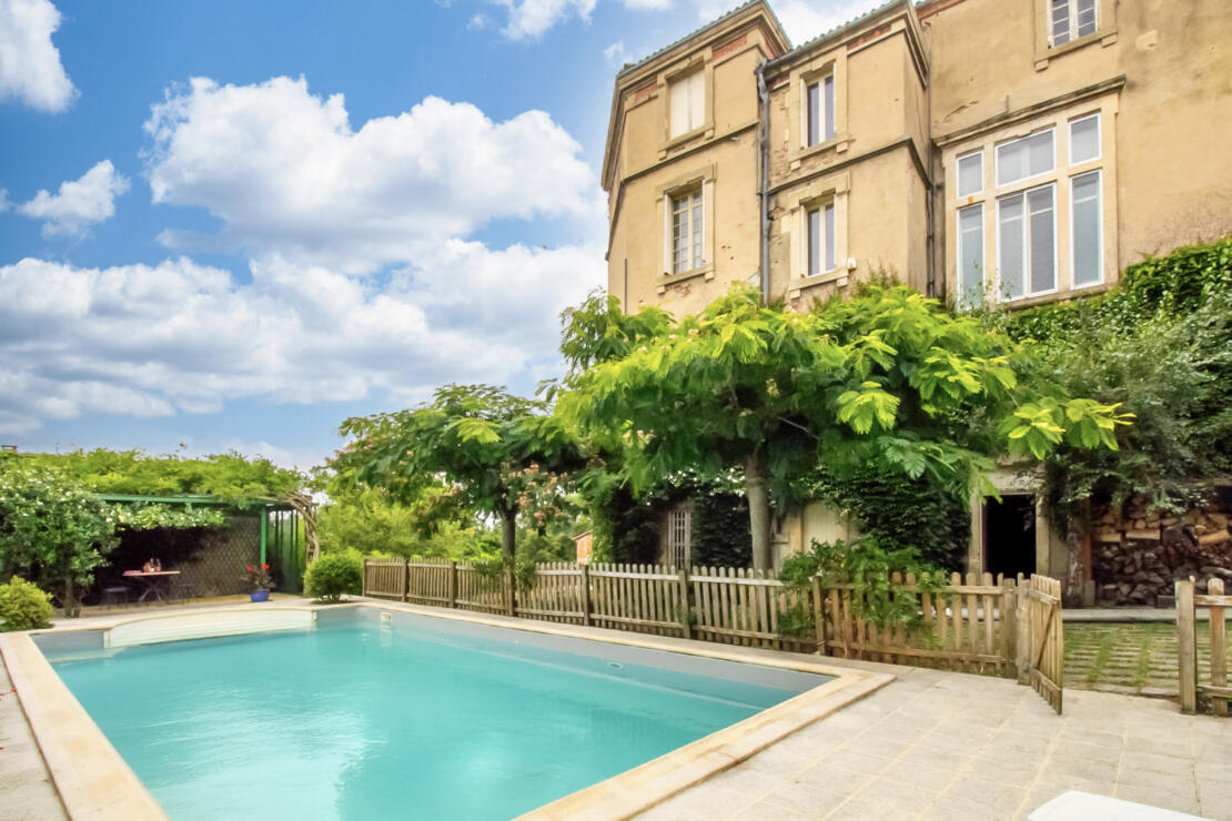 Beautiful chateau for sale with a pool, modern comforts and original historic features
