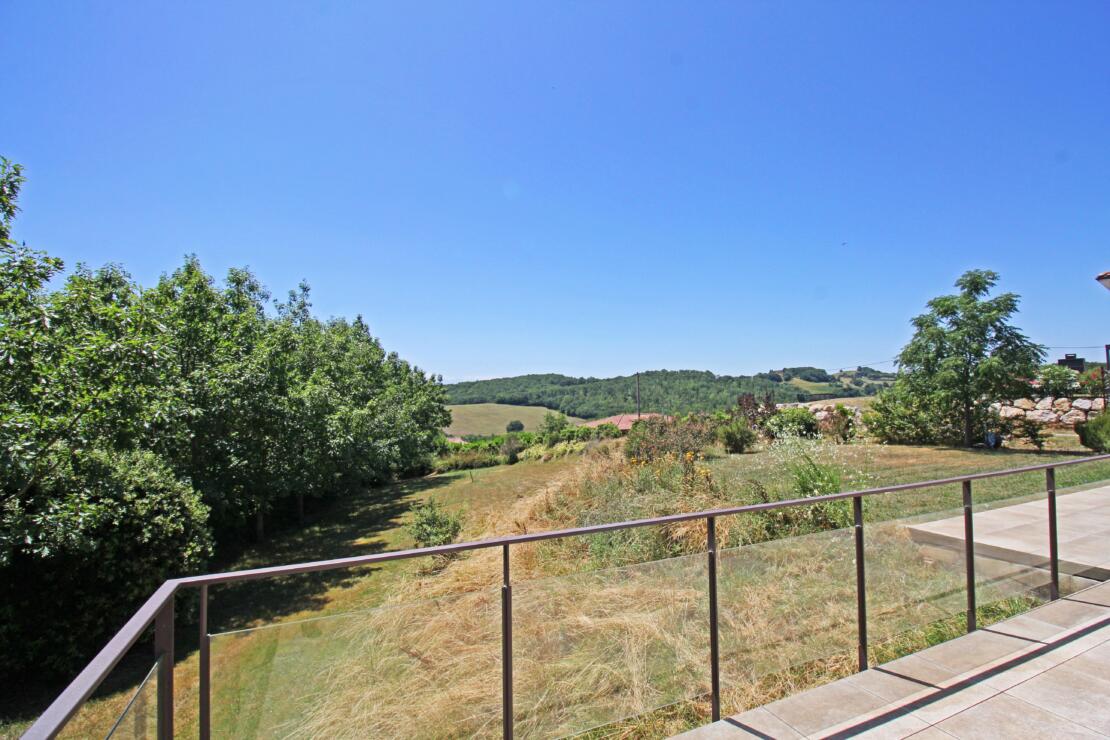 Modern light filled house with breathtaking views on a large plot with double garage near Pamiers