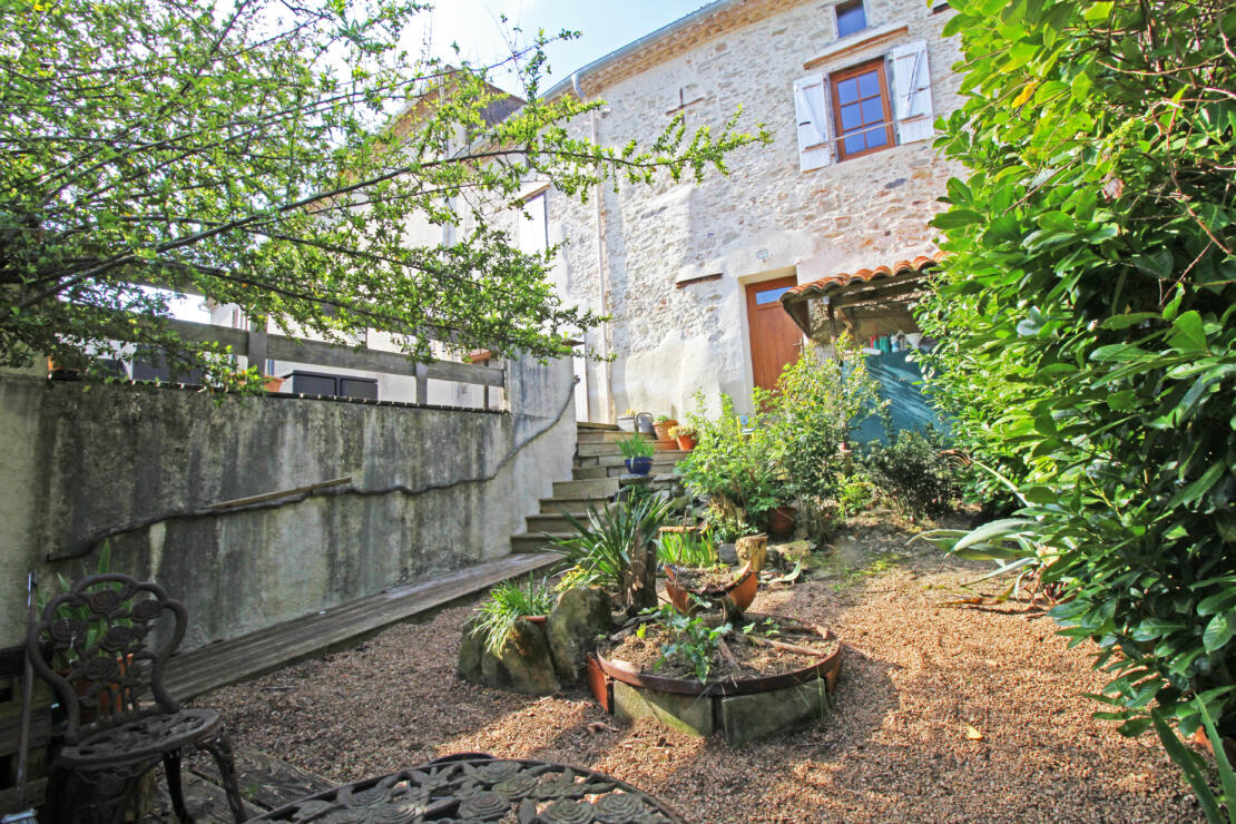 Charming, comfortable, stone village house with front garden and spacious rear terrace near Castelnaudary